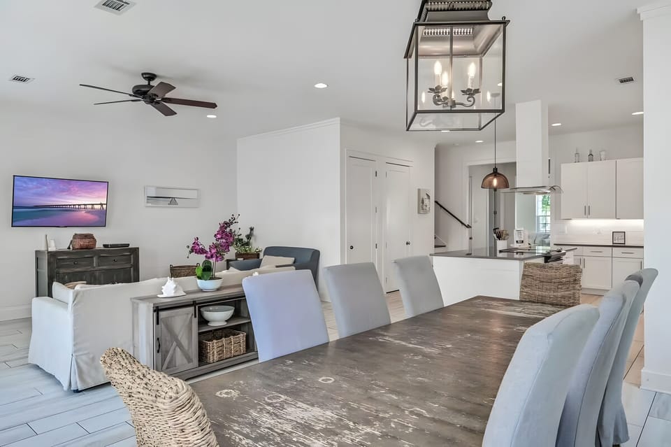 Spacious dining area seamlessly connected to the living and kitchen spaces.