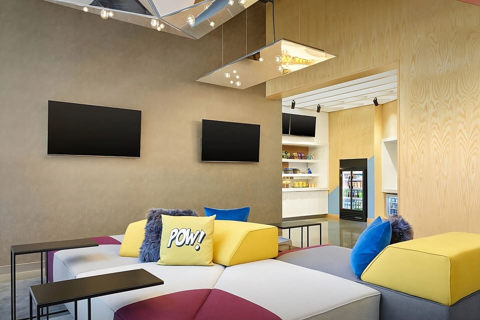 Kick back on playful modular sofas in a bright lounge.