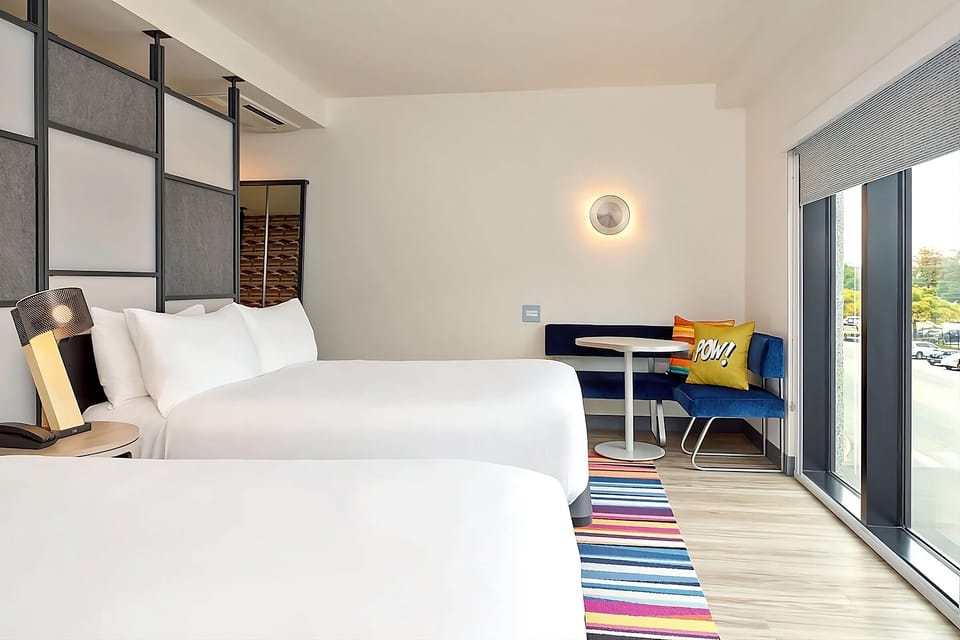 Settle in together with two comfy beds and sunny windows.