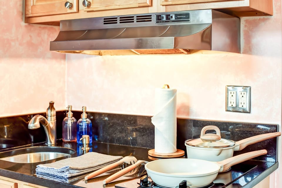 The kitchen may be small, but it’s stocked with all the essentials so you can whip up a cozy meal at home after a long day exploring Old Town’s shops, sights, and sweets.