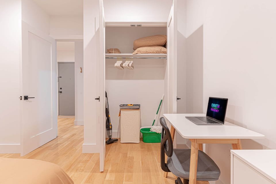 Bedroom closet area with essentials and storage keeps your belongings organized and tidy.
