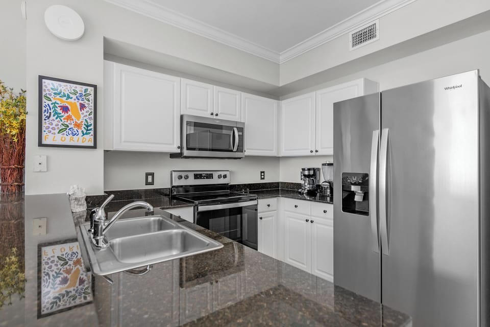 Coffee maker (drip), blender, pots/pans, utensils, etc.