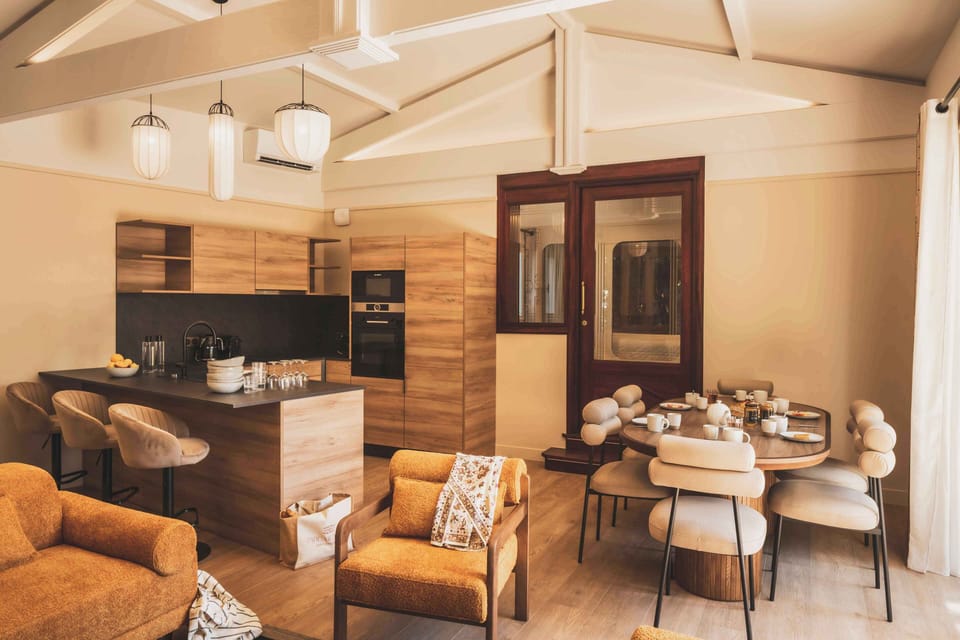 A cozy and inviting lounge where natural light and soft tones create a warm, relaxing atmosphere.