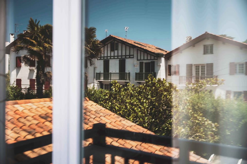 Traditional Basque rooftops and sunlit facades — your authentic Saint-Jean-de-Luz view from the apartment.
