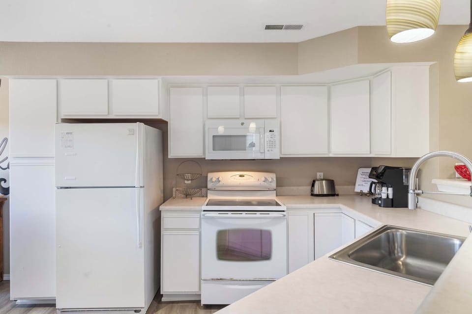 The open kitchen is well equipped for an unforgettable getaway​