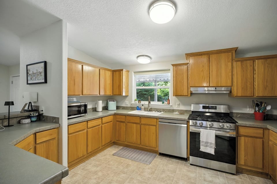 The well-stocked kitchen has a dishwasher, and dedicated icemaker and is stocked with gadgets like an air fryer.