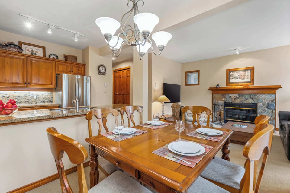 - Open-concept Whistler condo with kitchen, dining, and living area  
- Ideal for families seeking comfort near slopes and village life  
- Mountain getaway with style, warmth, and modern convenience  