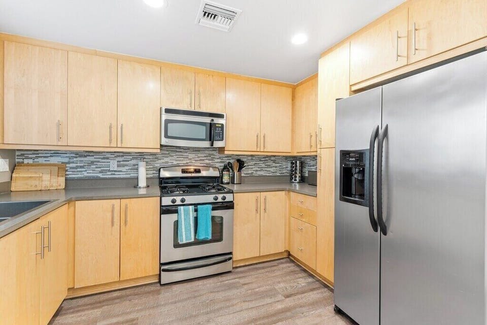 Find extra storage and an ice dispenser in the full-sized refrigerator.
