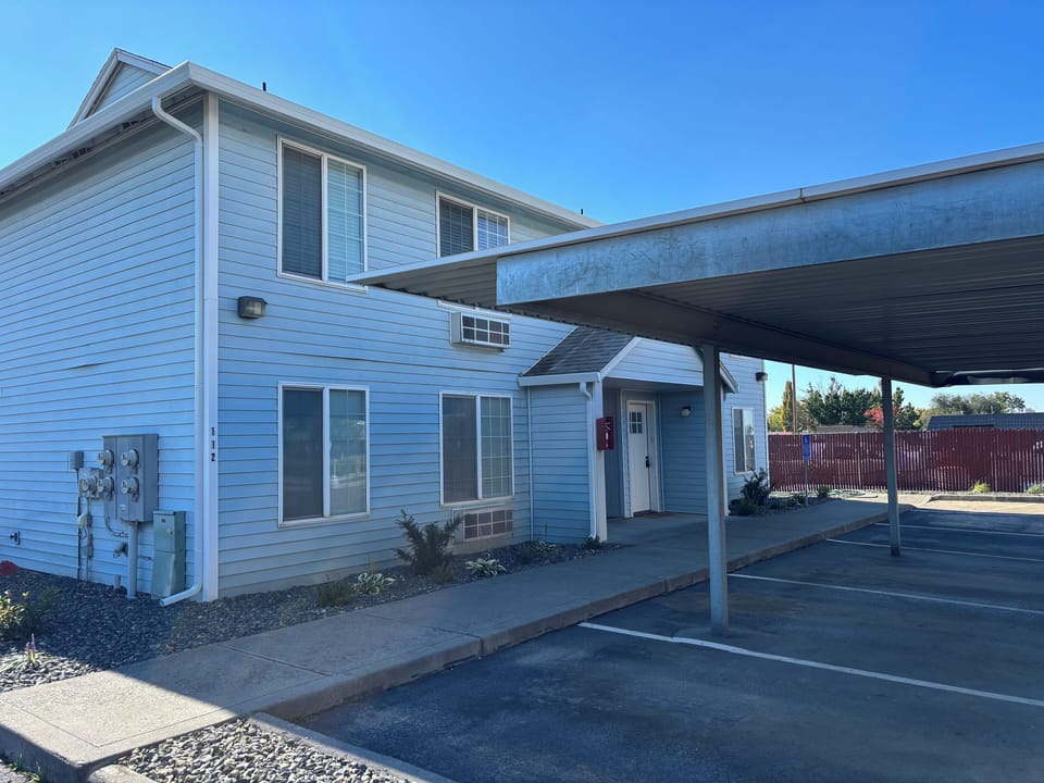 Exterior with covered parking