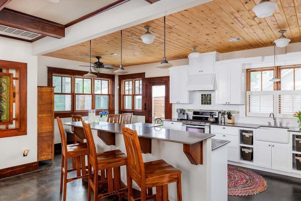 Thoughtfully Designed Kitchen with Barstools for Three
