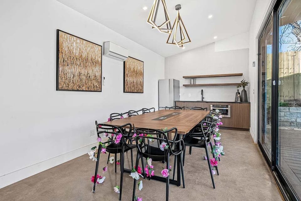 Dining Table with Floor to Ceiling windows
