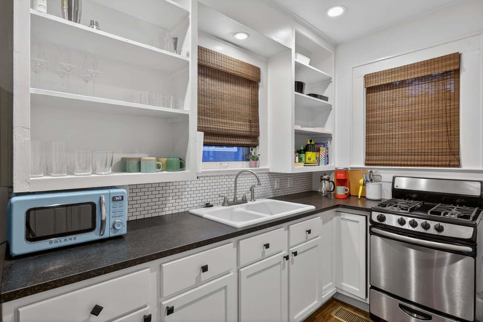 Equipped with a Microwave, Coffee Maker, and Gas Range