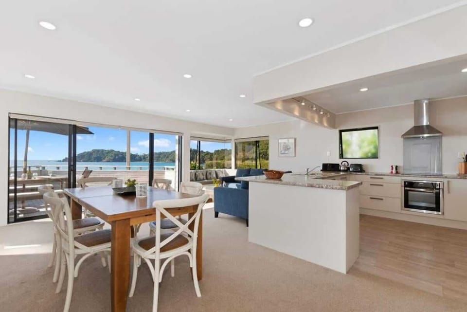 Open plan kitchen dining with stunning views