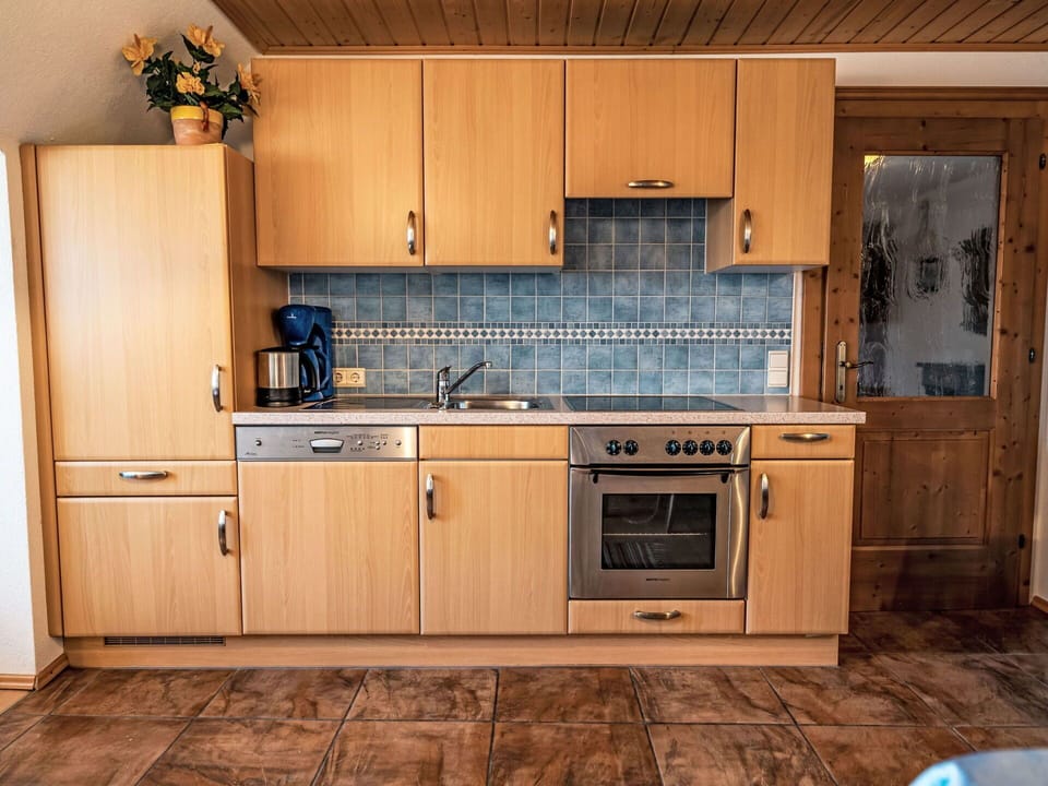 Brown, Cabinetry, Countertop, Property, Furniture, Building, Kitchen, Sink, Kitchen Stove, Kitchen Appliance