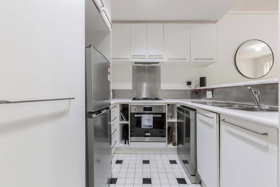 Fully equipped kitchen with high-end appliances. 