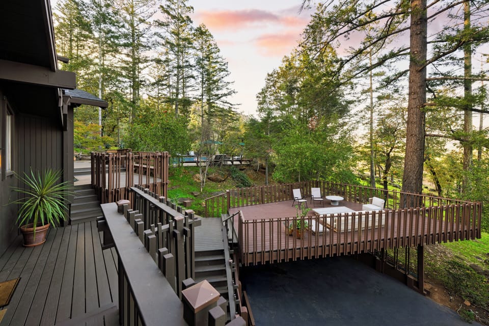 Unwind and enjoy forest views from the deck.