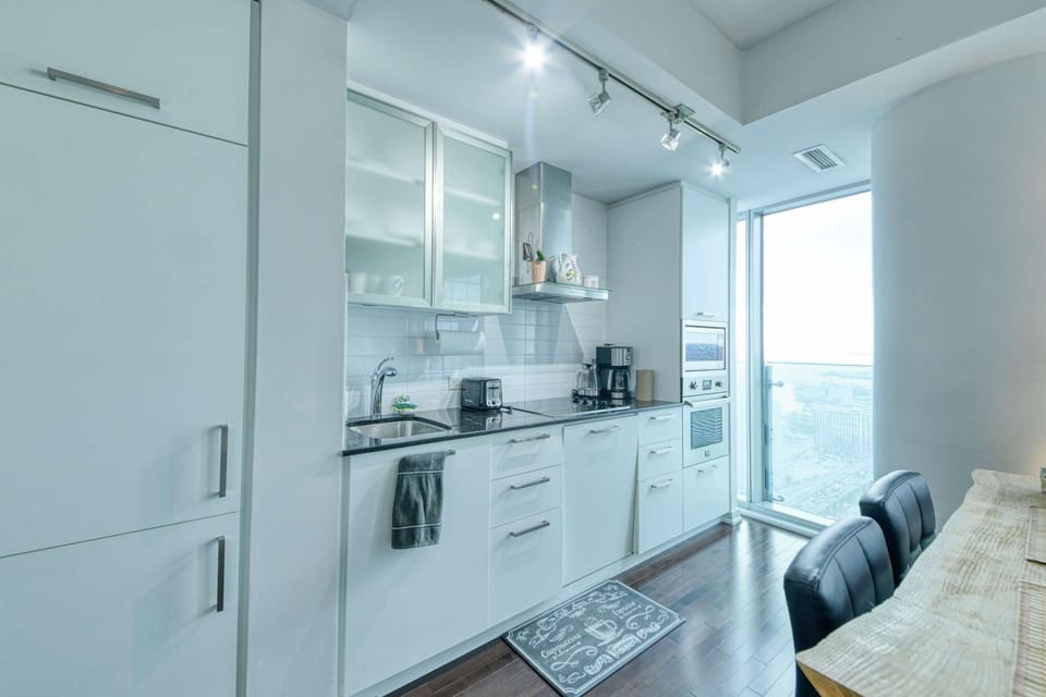 Prepare a meal with ease in this bright, fully-equipped kitchen with a view.