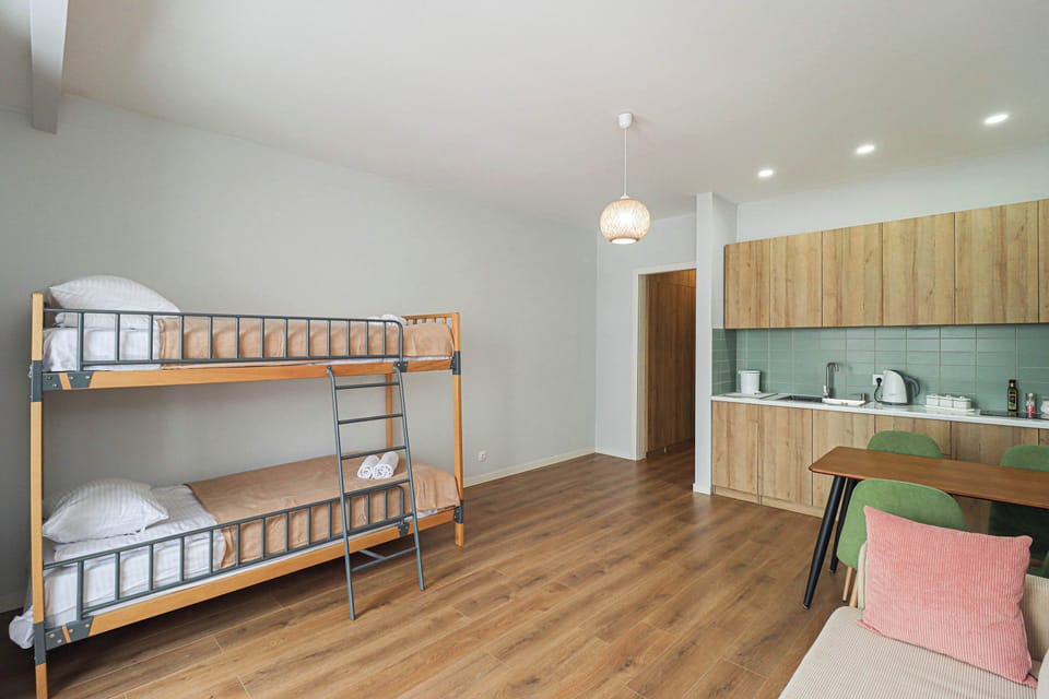 The apartment has a lovely array of soft, colorful shades that create a peaceful and relaxing atmosphere. 