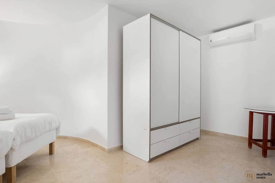 Closet from downstairs bedroom.