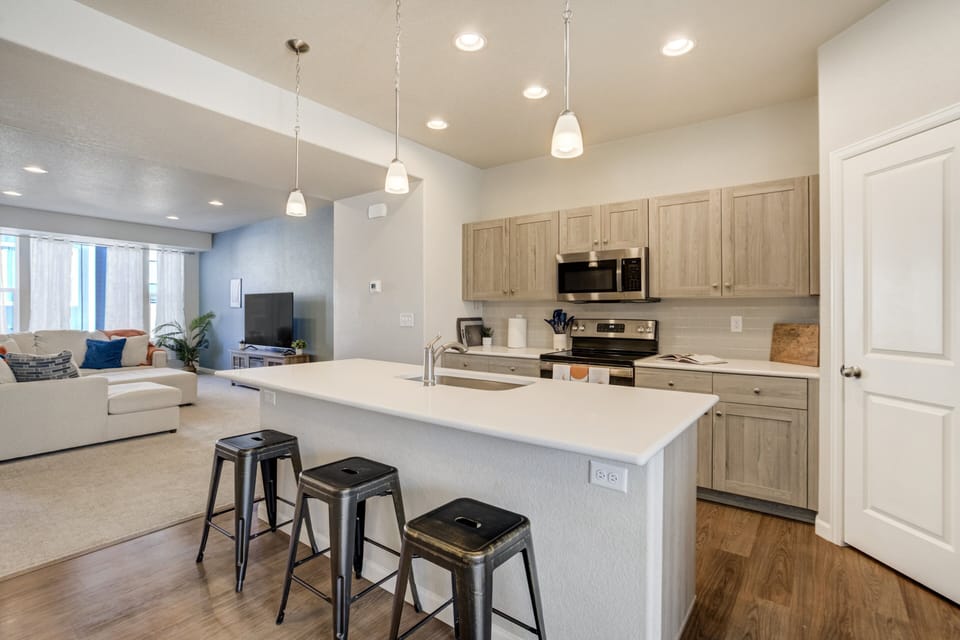 With additional seating at the kitchen island.