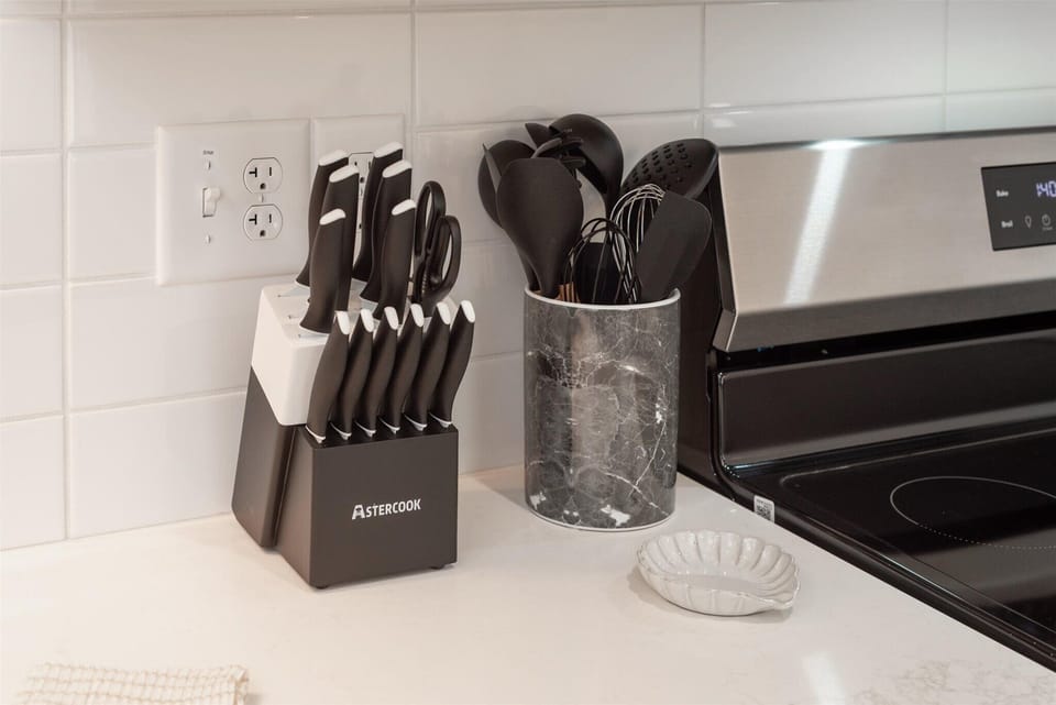 Every detail considered—sharp knives, essential utensils, and clean counters ready for your inner chef to shine.