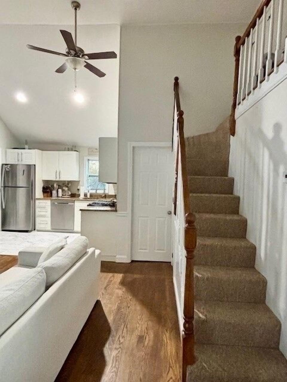 Living room and stairs up to loft