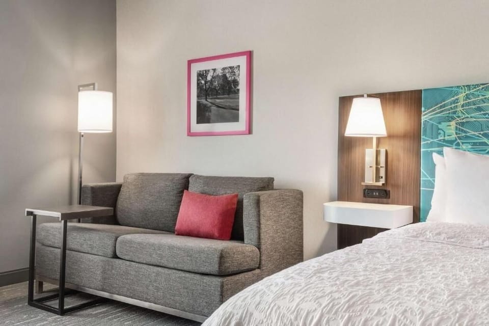 Settle into a restful night with plush linens nearby.