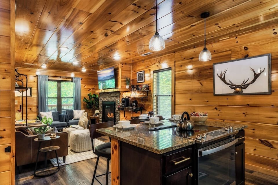 A beautifully designed cabin interior featuring sleek countertops, modern and a stylish living space
