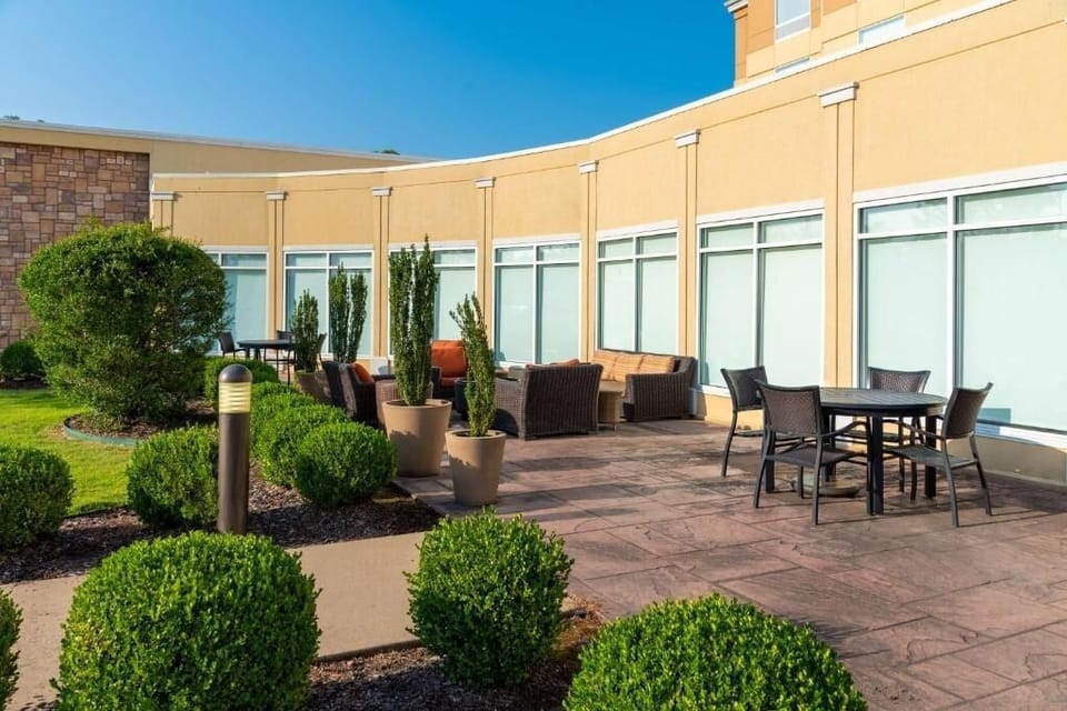 Unwind on the sunny patio with comfy lounge seating.