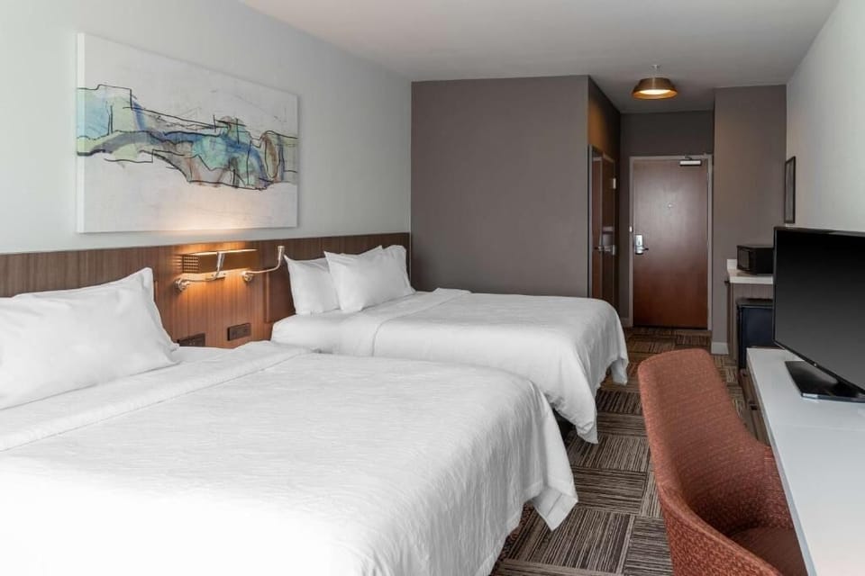 Unwind in crisp beds after a day of exploring.