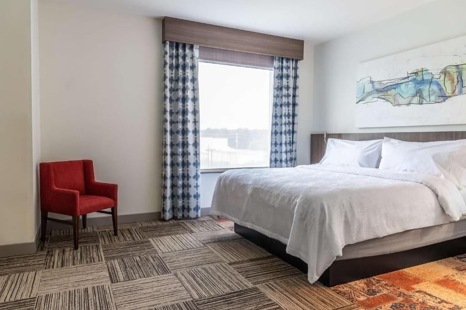 Move effortlessly between sleeping and lounging areas in this suite.