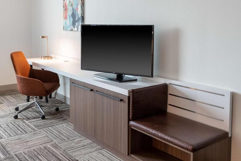 Plug in, focus, and stream easily from the roomy desk setup.
