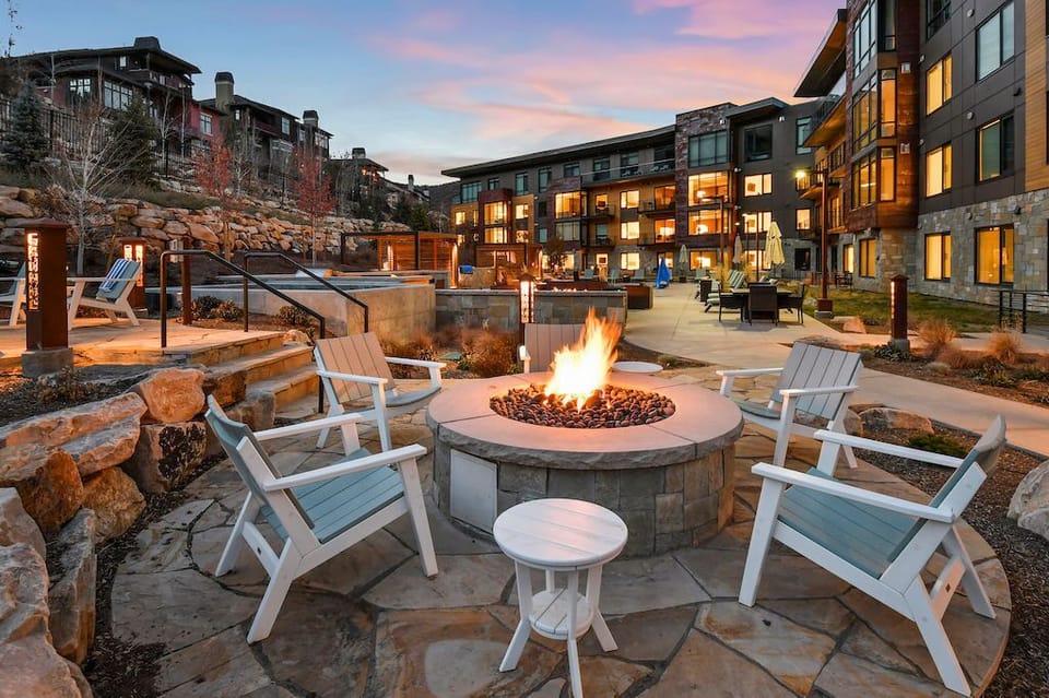 Warm up by the outdoor fire pit with friends and family.