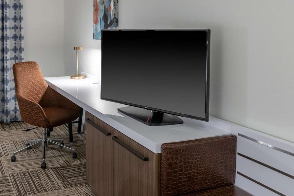 Plug in, focus, and stream easily from the roomy desk setup.