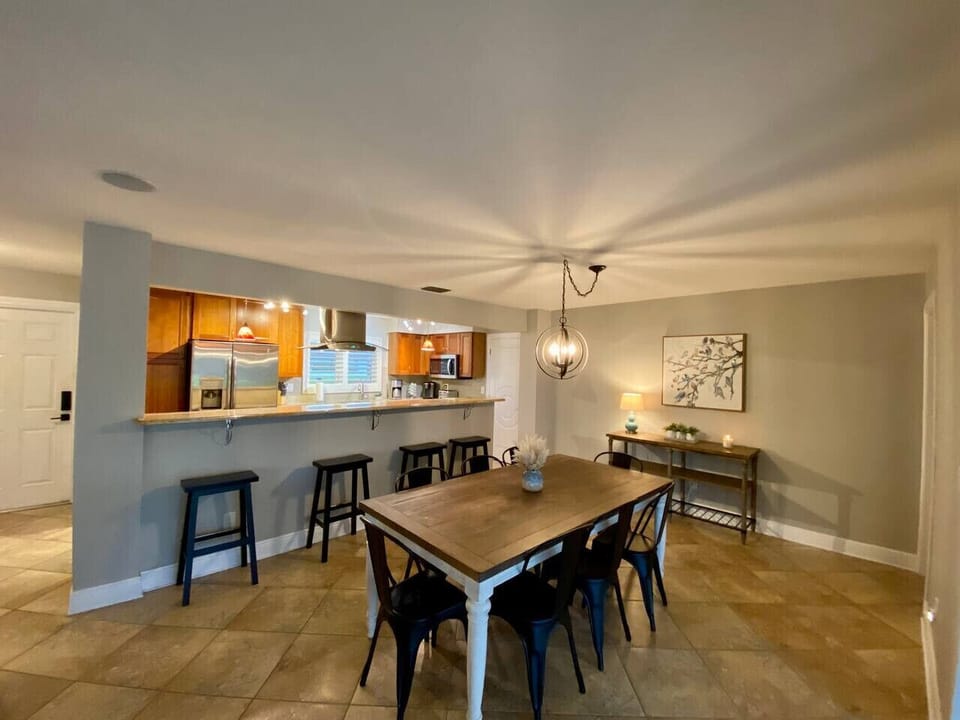 Dining Room & Kitchen - ideal open floorplan with incredible flow from the kitchen, dining, living and outdoor patio