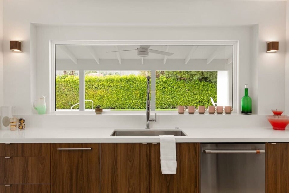Stylish Fully-Equipped Kitchen Has Pool and Mountain View