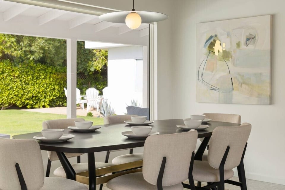 Formal Dining Room Seats Eight And Overlooks Pool