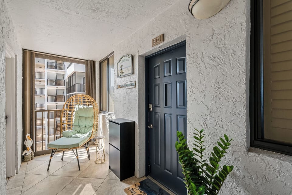 Peaceful entry with comfy egg chair for relaxing/reading