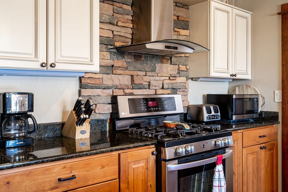 Kitchen - everything for home-cooked meals provided ('cept the food :( so sorry)