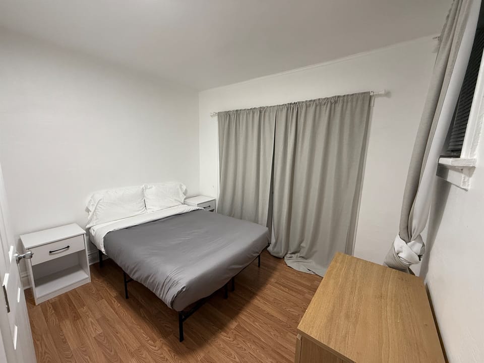 Front Bedroom with entrance to Balcony