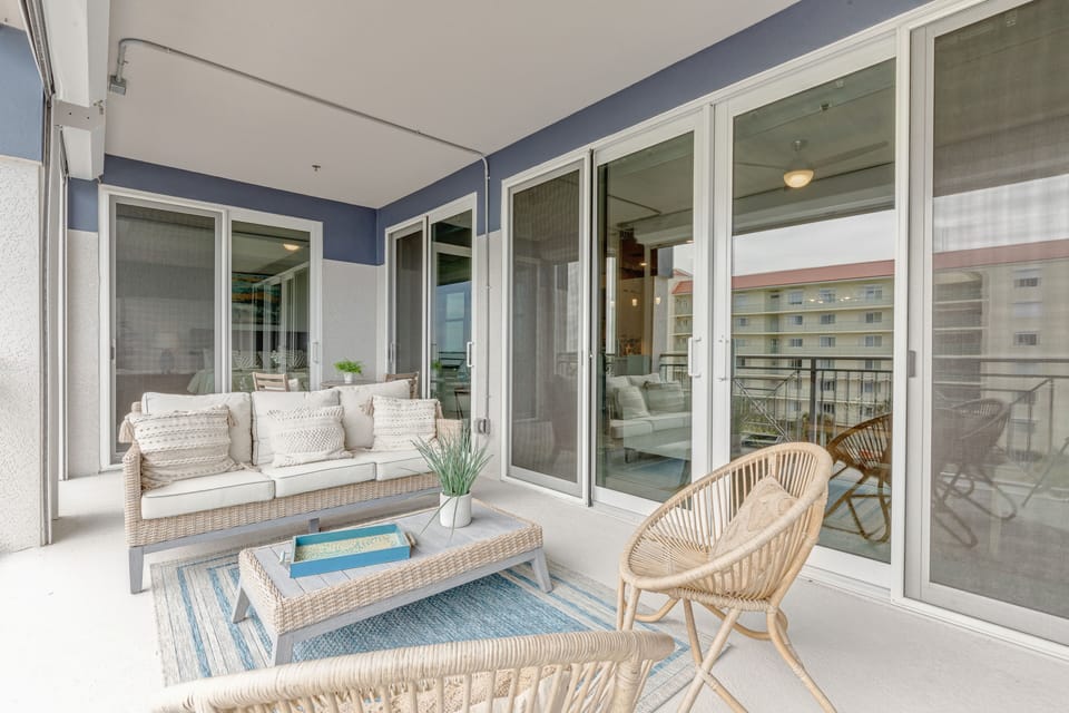 Large outdoor balcony with plenty of seating options