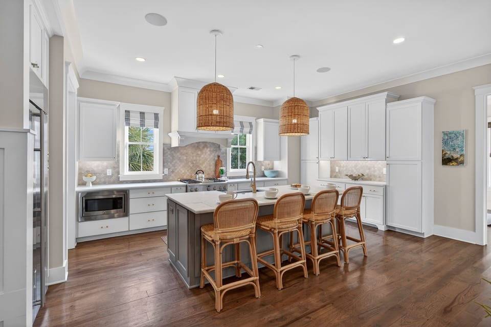 The beautiful kitchen is fully updated with plenty of counter space and lovely finishes