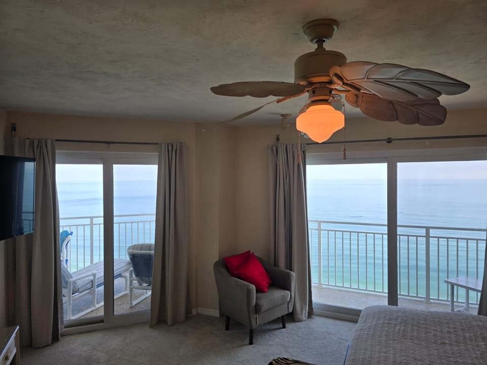 Bedroom 1 with 2 oceanfront balcony doors.
