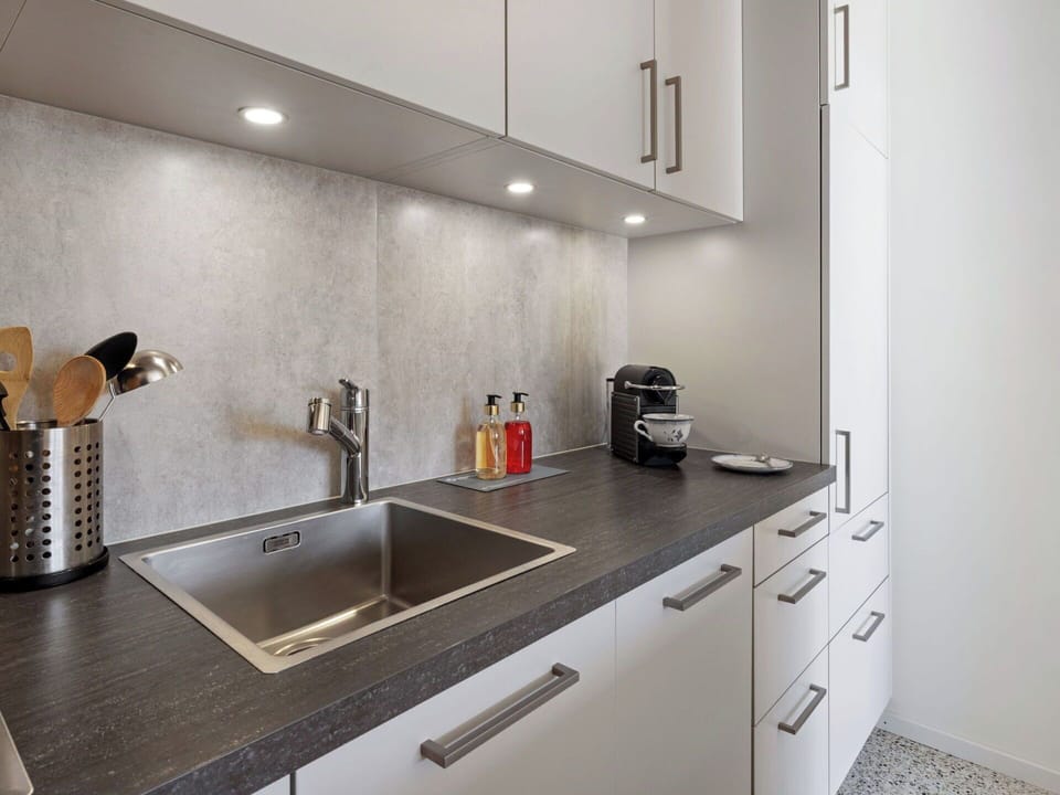 Kitchen, Countertop, Interior Design, Cabinetry, Flooring, Kitchen Appliance, Kitchen Sink, Major Appliance, Sink, Plumbing Fixture