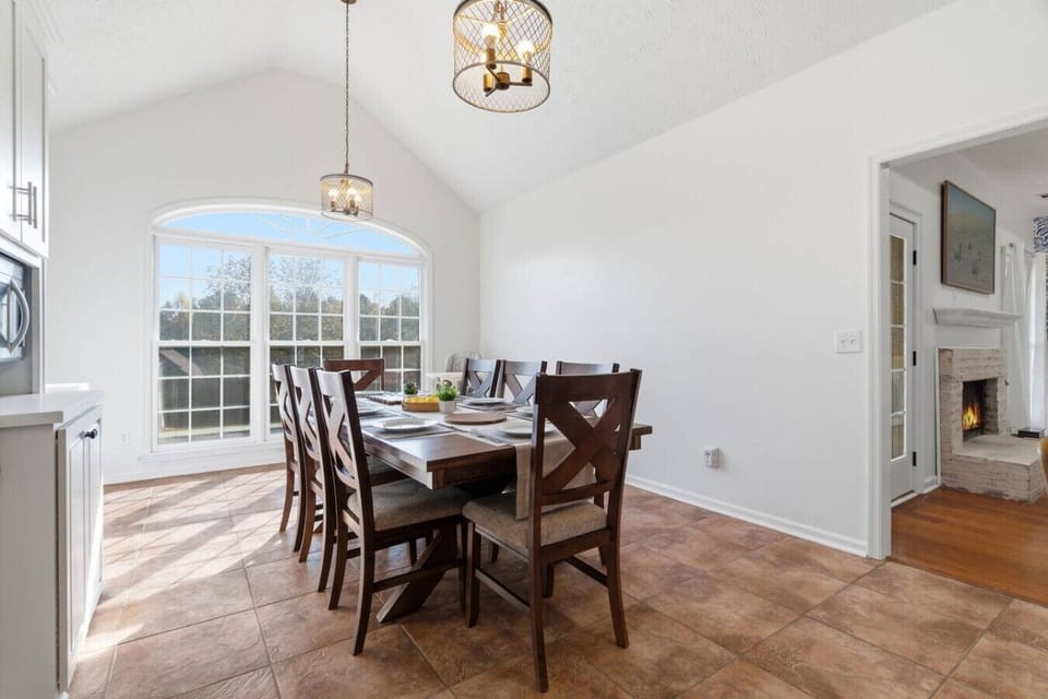 Open-Concept Dining and Kitchen — Seamless design for family meals and easy entertaining.