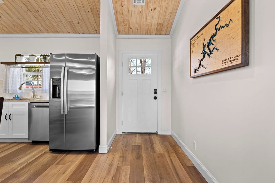 Front entry leads into open concept kitchen, dining, and living areas!