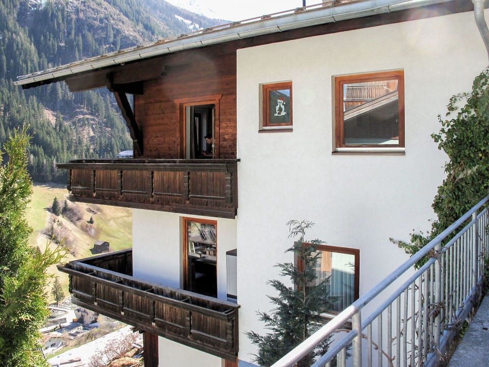 Sky, Property, Window, Building, Wood, Cloud, Plant, Neighbourhood, Tree, Mountain