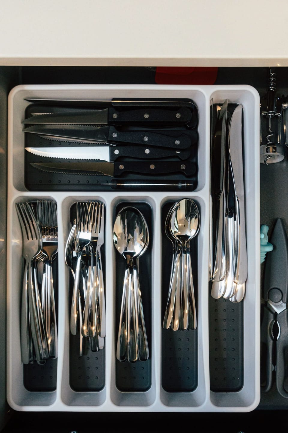 Attention to detail matters—down to the clean, well-stocked utensil drawer.