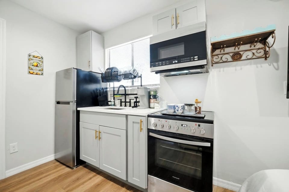 Full size kitchen with coffee station and everything you could ever need.
