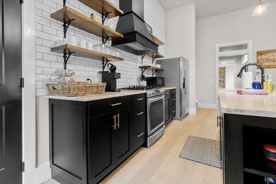 Fully stocked open concept kitchen, located on the entry level